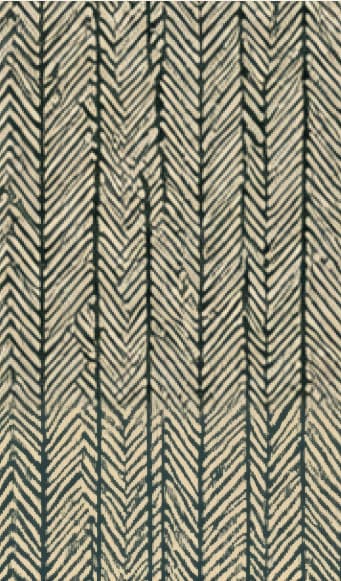 Textile à chevrons vert et crème, tissu d’origine de la sellerie.